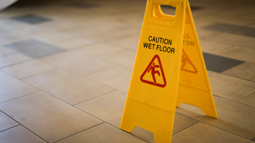 Close up shot of a wet floor sign